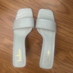 Never been worn before heeled sandals! Very cute just don’t fit my feet!